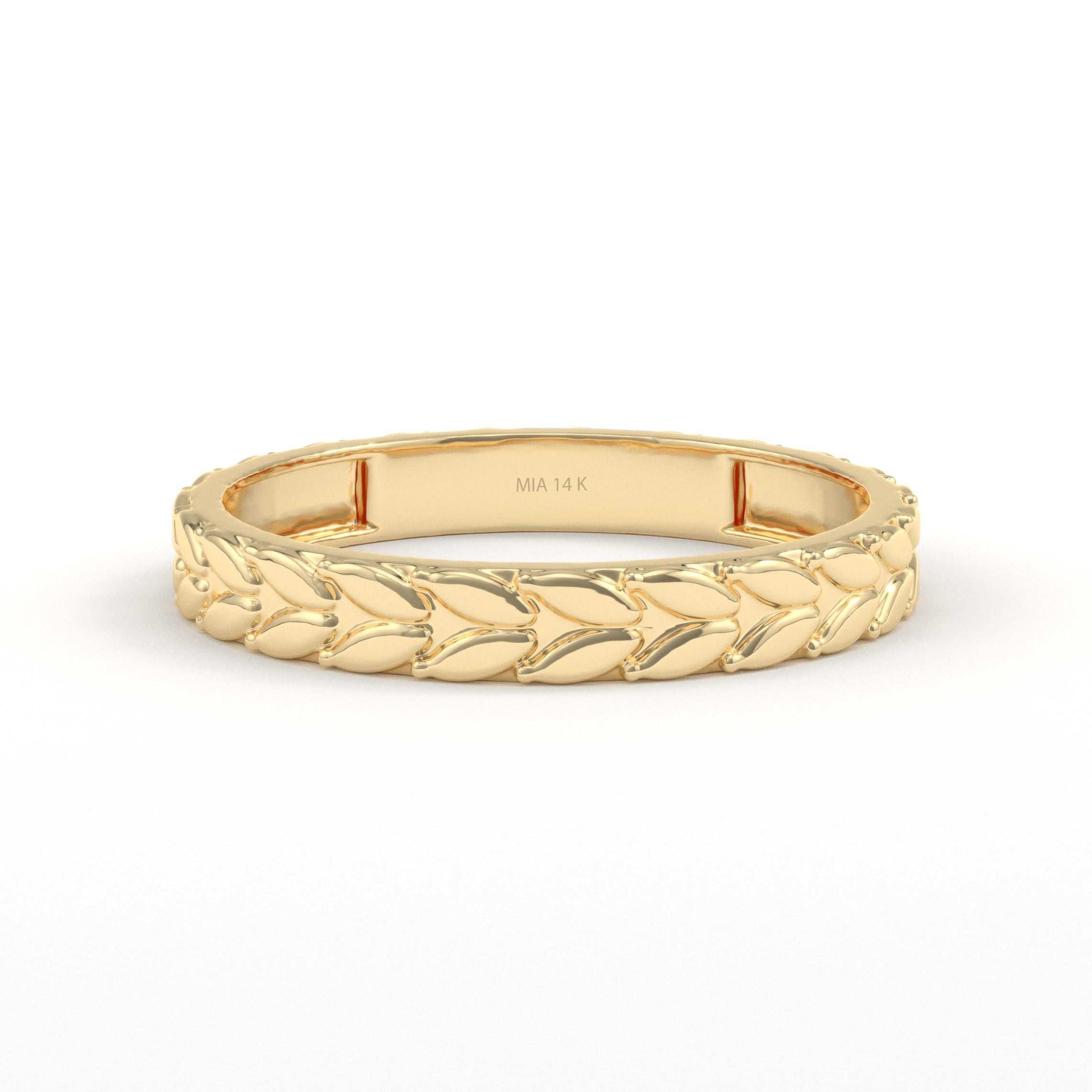 yellow gold leaf pattern wedding band