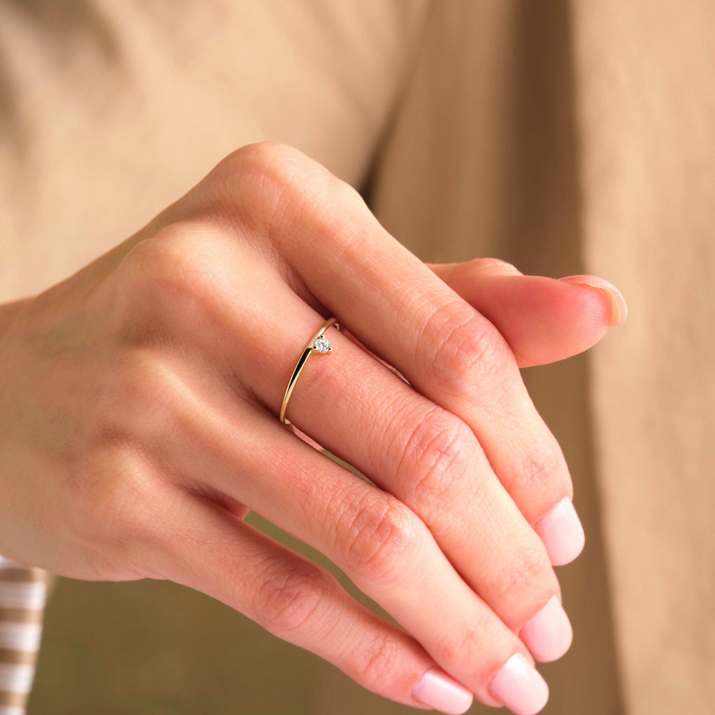 Floating CZ Diamond on Minimalist Round Band