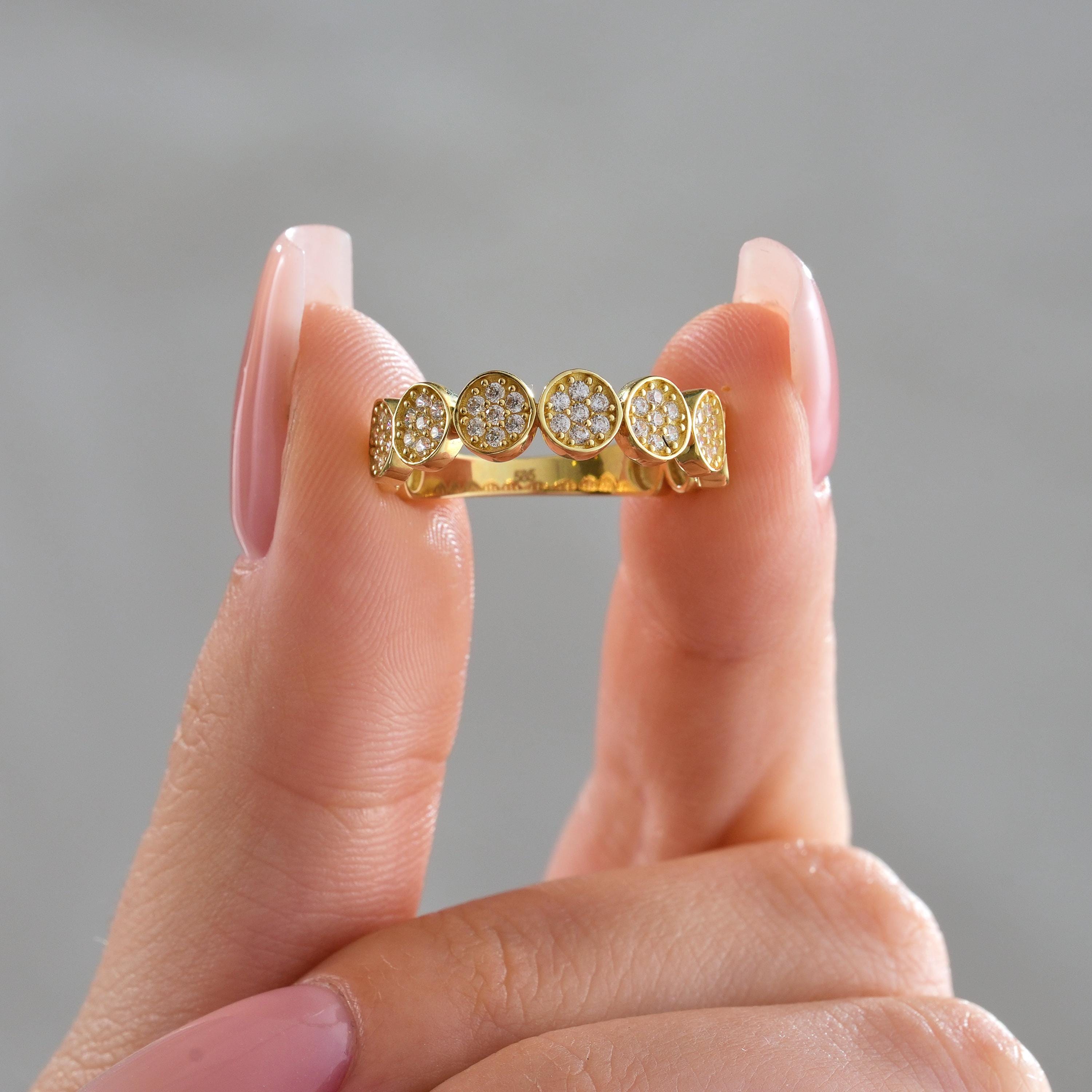 Half Eternity Band With Round Cluster Cubic Zirconia