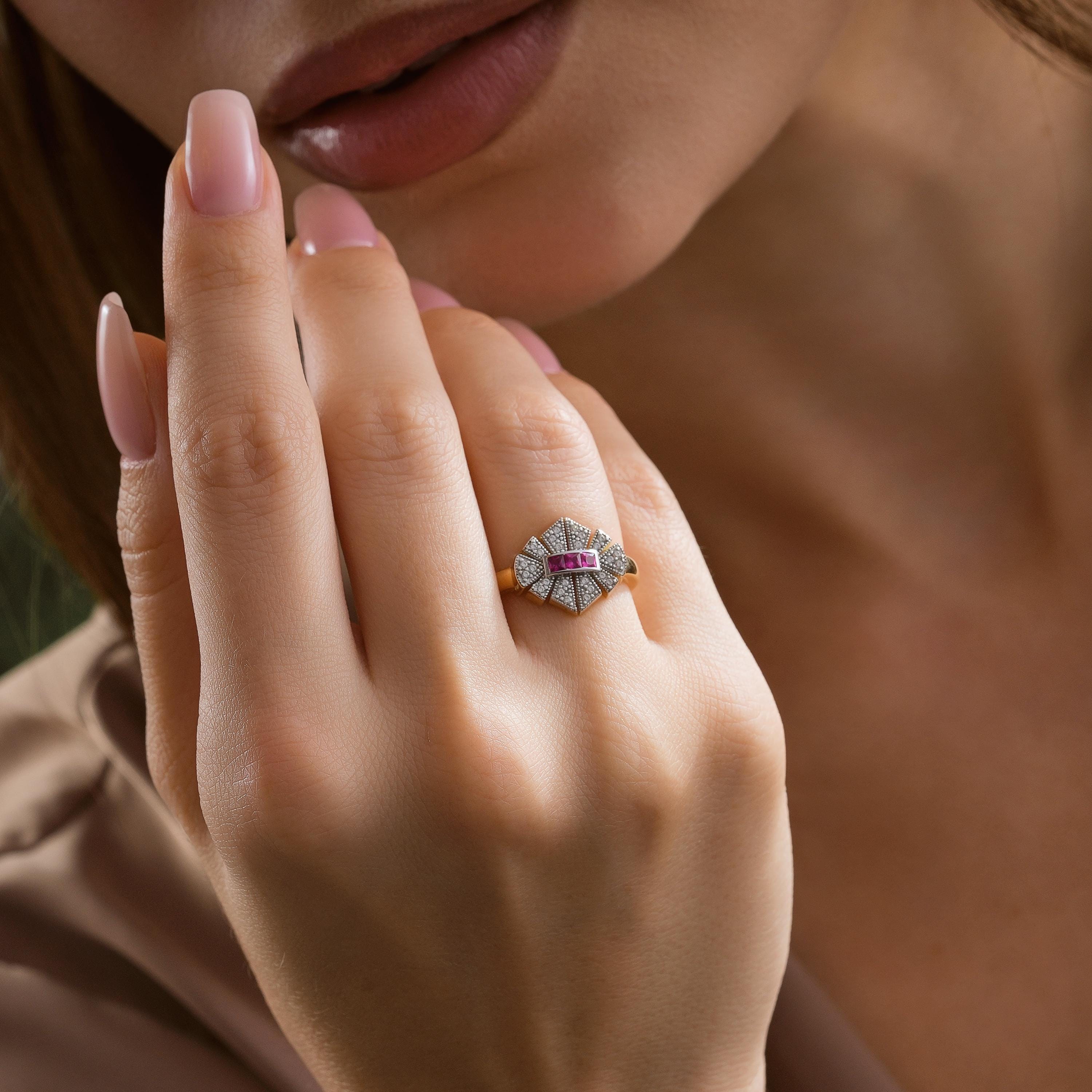 geometric fan shape ruby and zirconia cluster ring