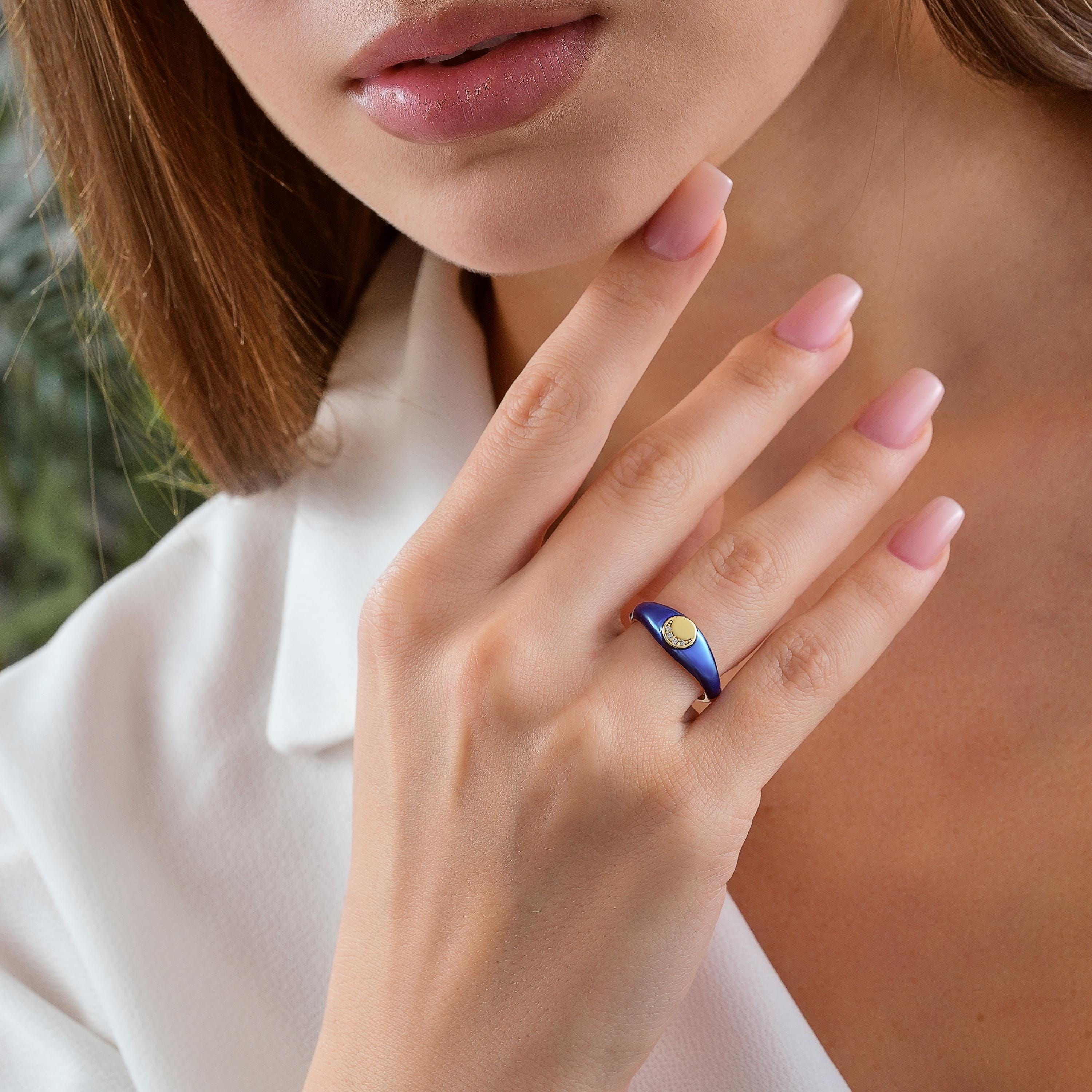 solid gold navy enamel ring with crescent pavé CZ diamonds on round disk