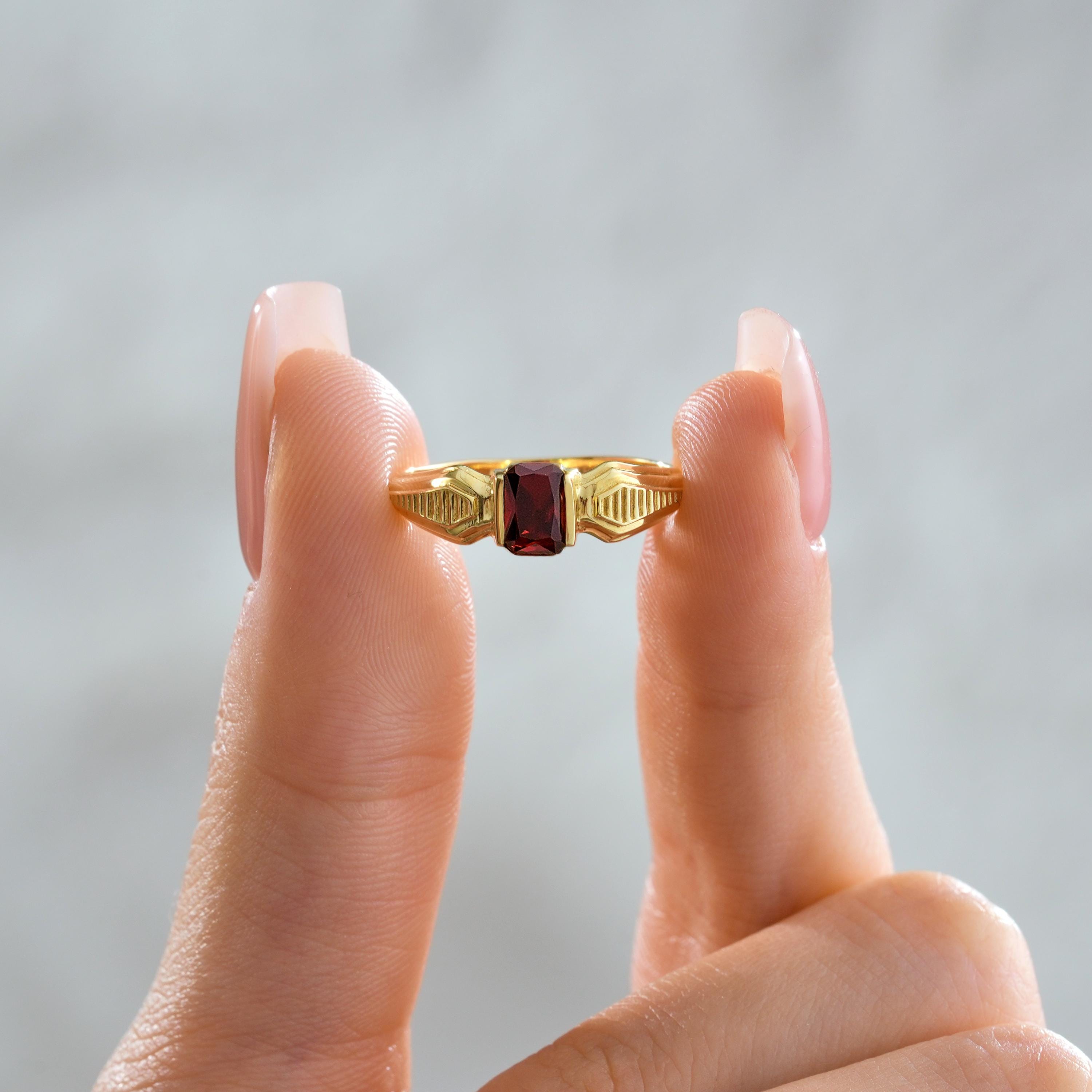 garnet color emerald cut solid gold ring