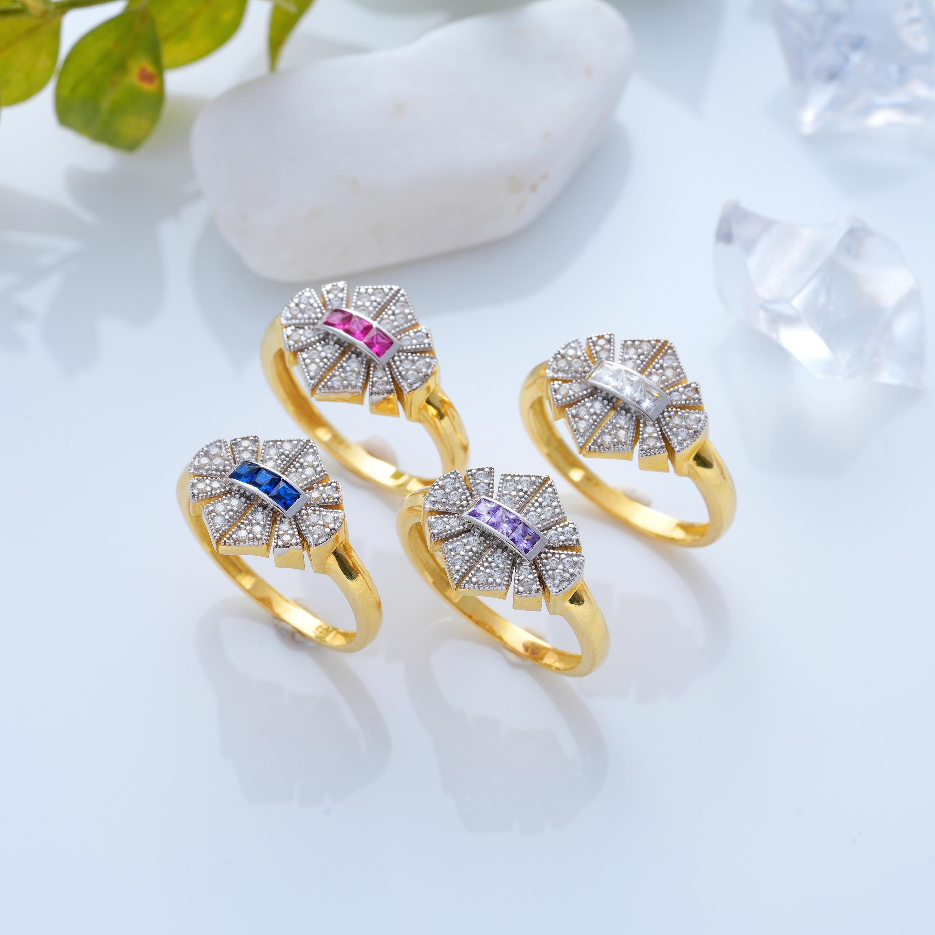 princess cut gemstone and round diamond rings