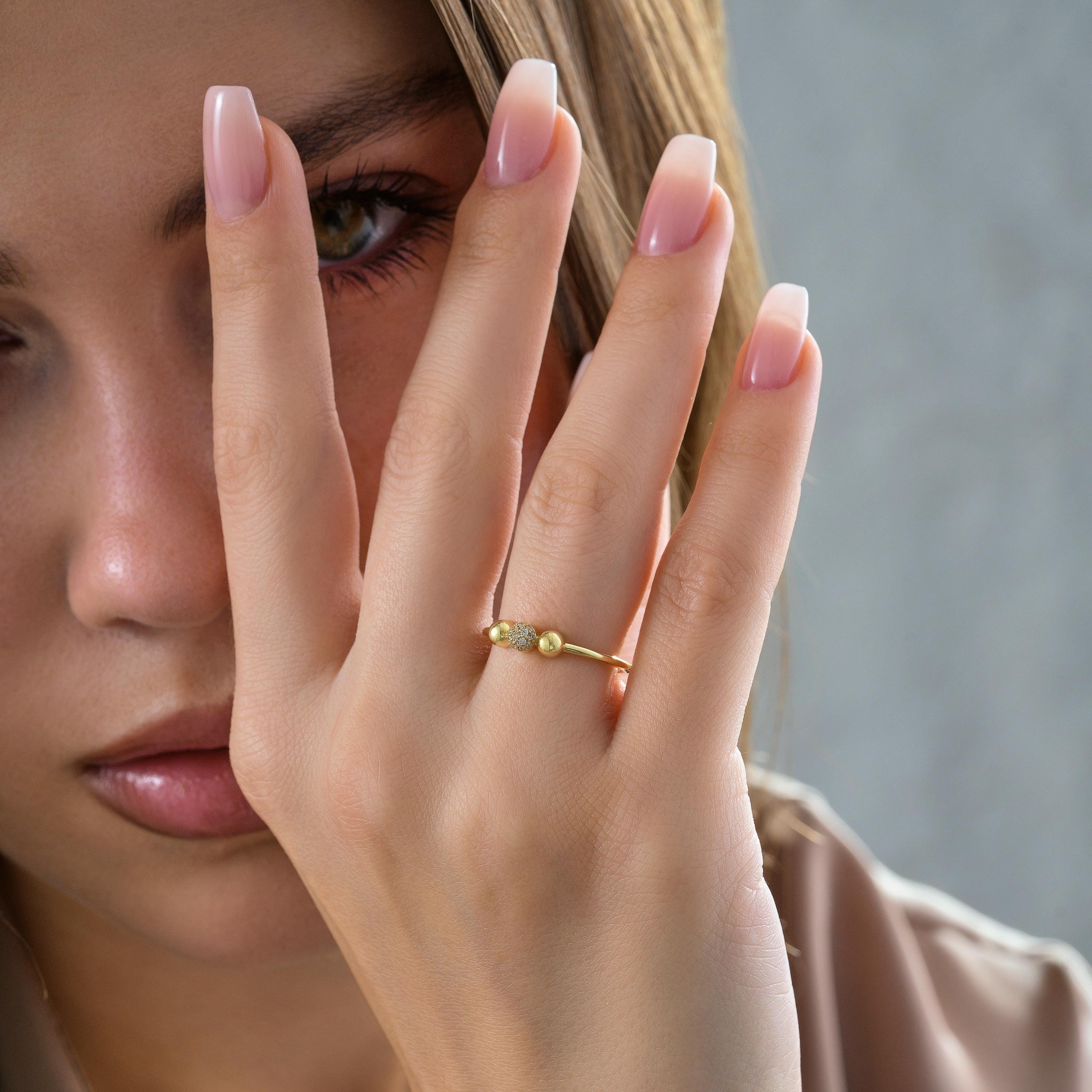 minimalist gold beaded ring with a pave CZ sphere
