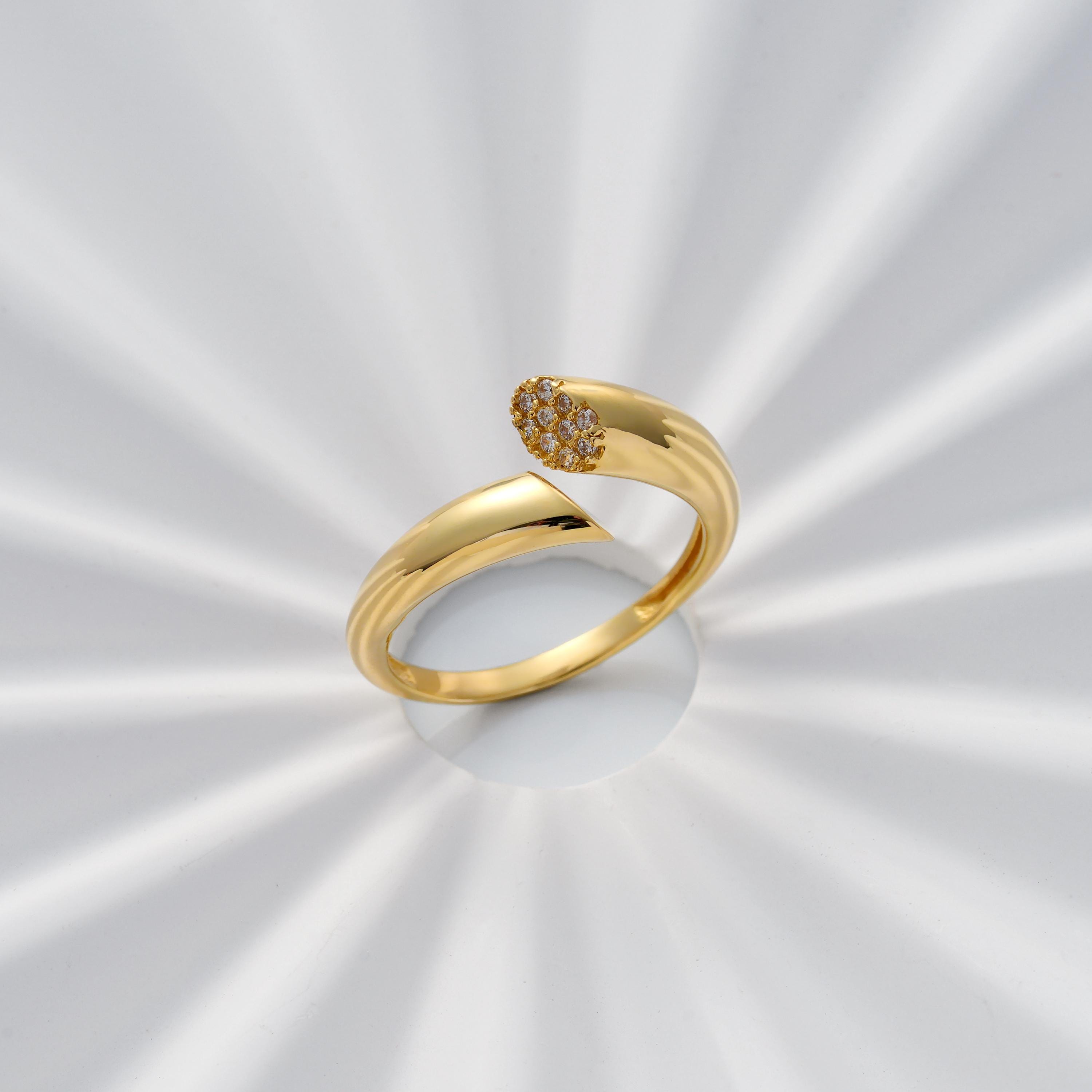 solid gold open cuff ring with pavé CZ diamond cluster tip and pointed end