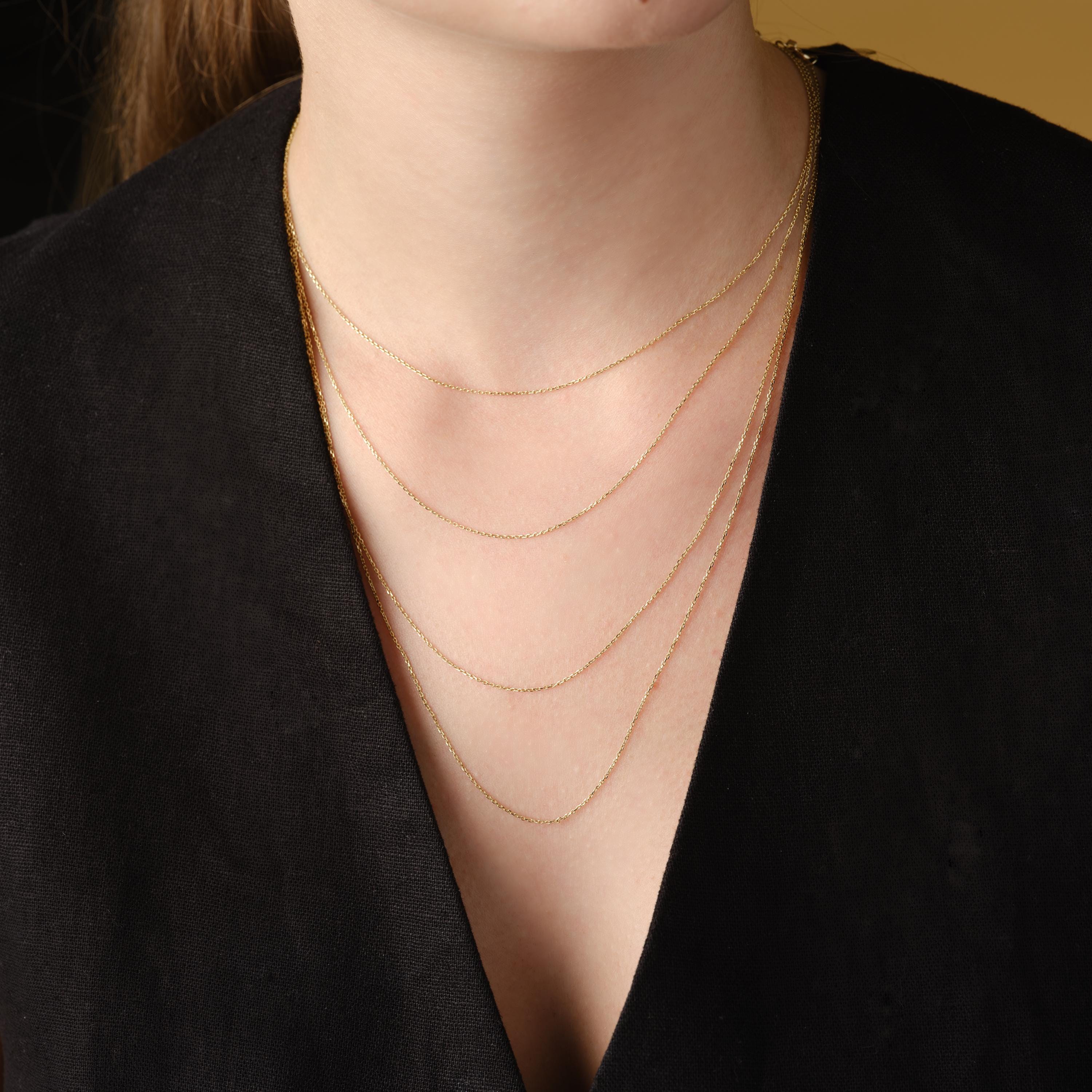 layering 4 solid gold chains