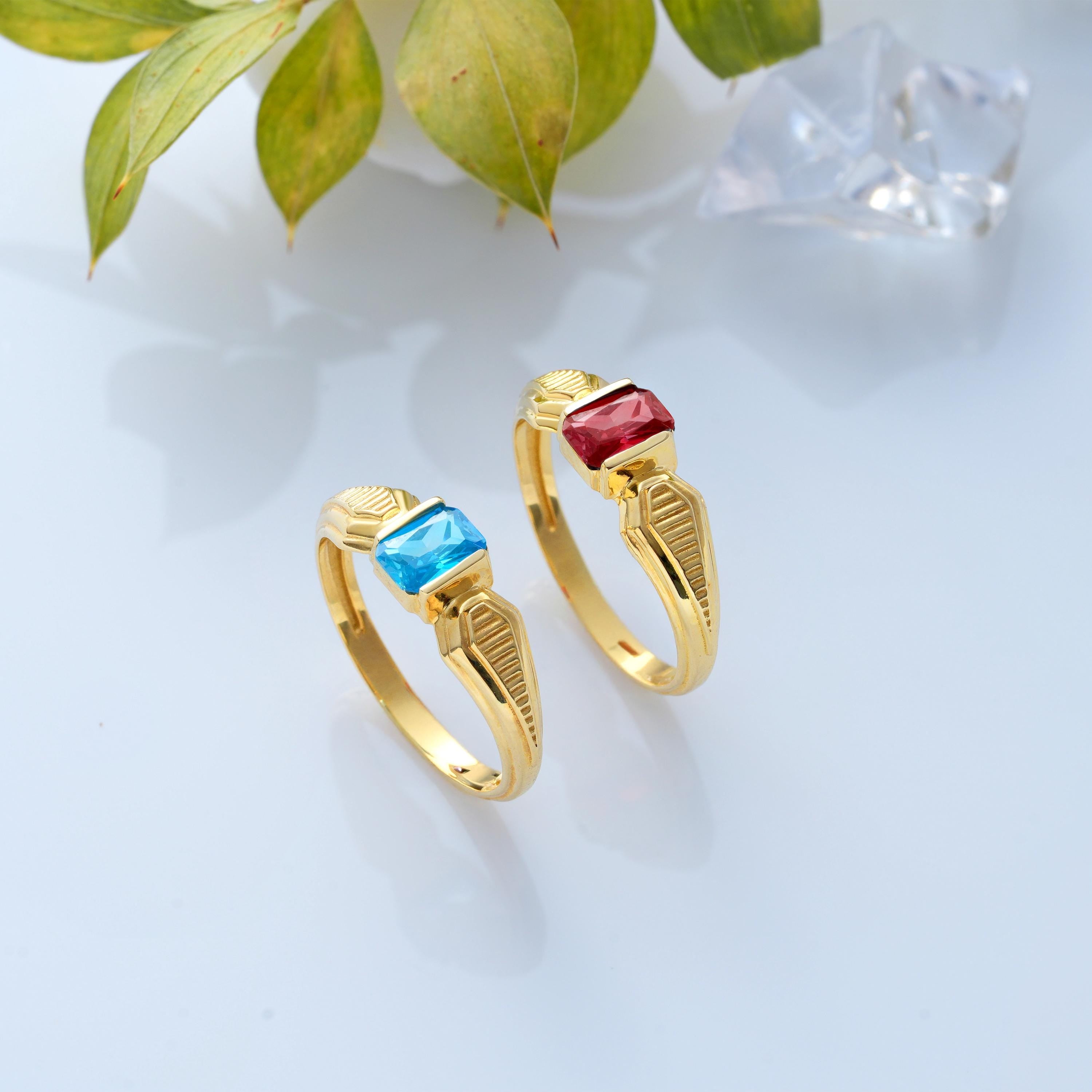 Garnet and Blue Topaz Custom Birthstone Rings