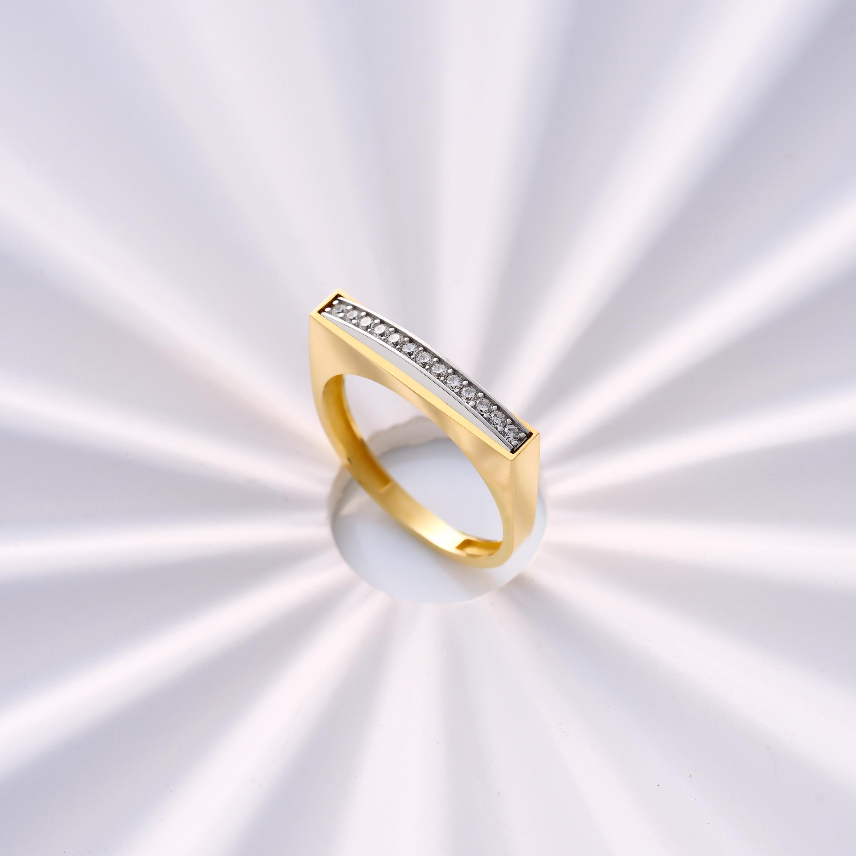 two tone white gold geometric bar ring channel set CZ diamonds forming a modern elegant band