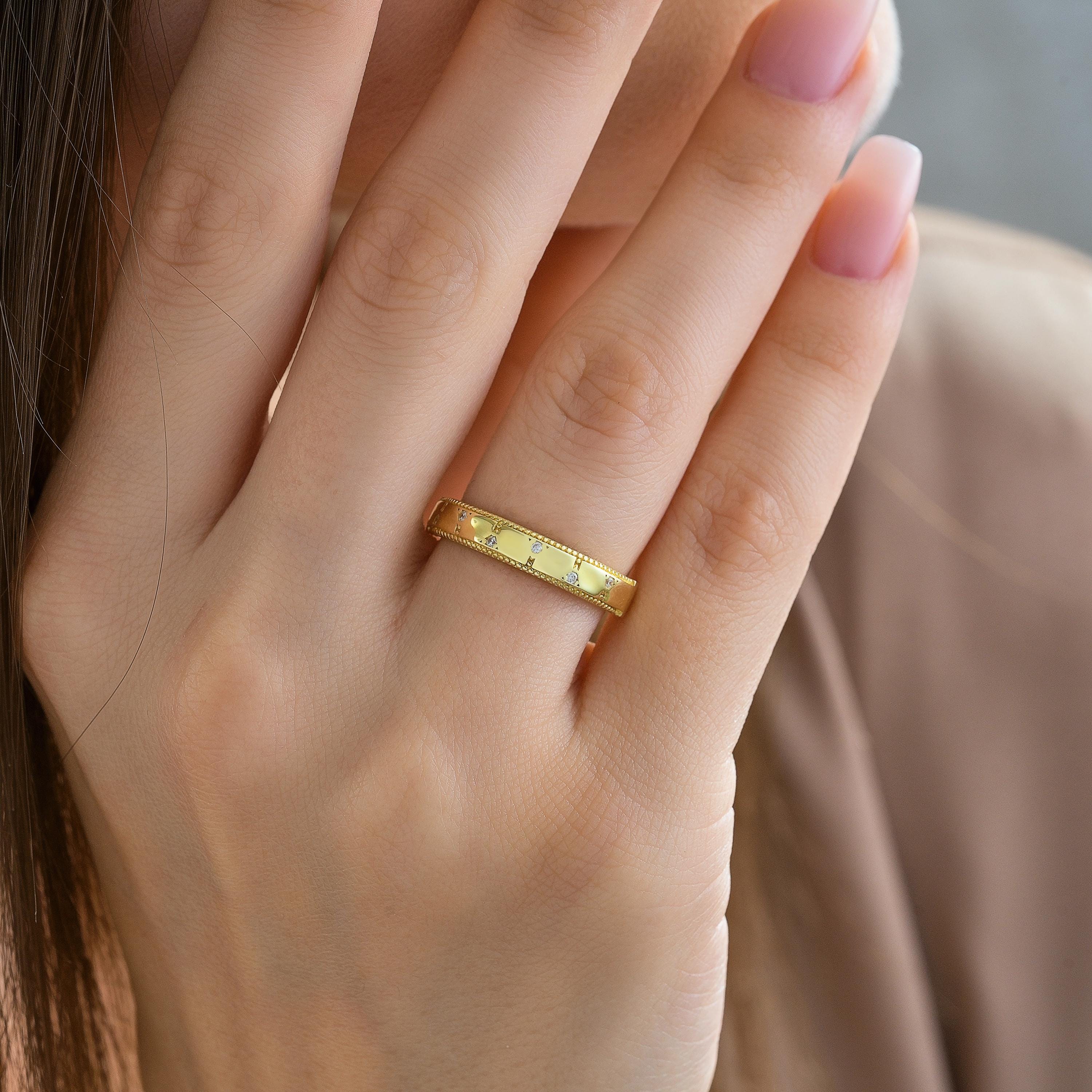 scattered flush set diamond wedding band gold